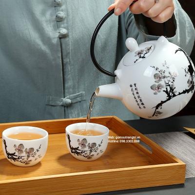 BỘ ẤM CHÉN HOA ĐÀO VẼ THEO LỐI THƯ PHÁP